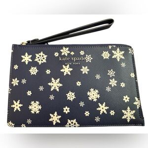 Kate Spade Midnight Blue Snowflake Wristlet in coated canvas. NWT
